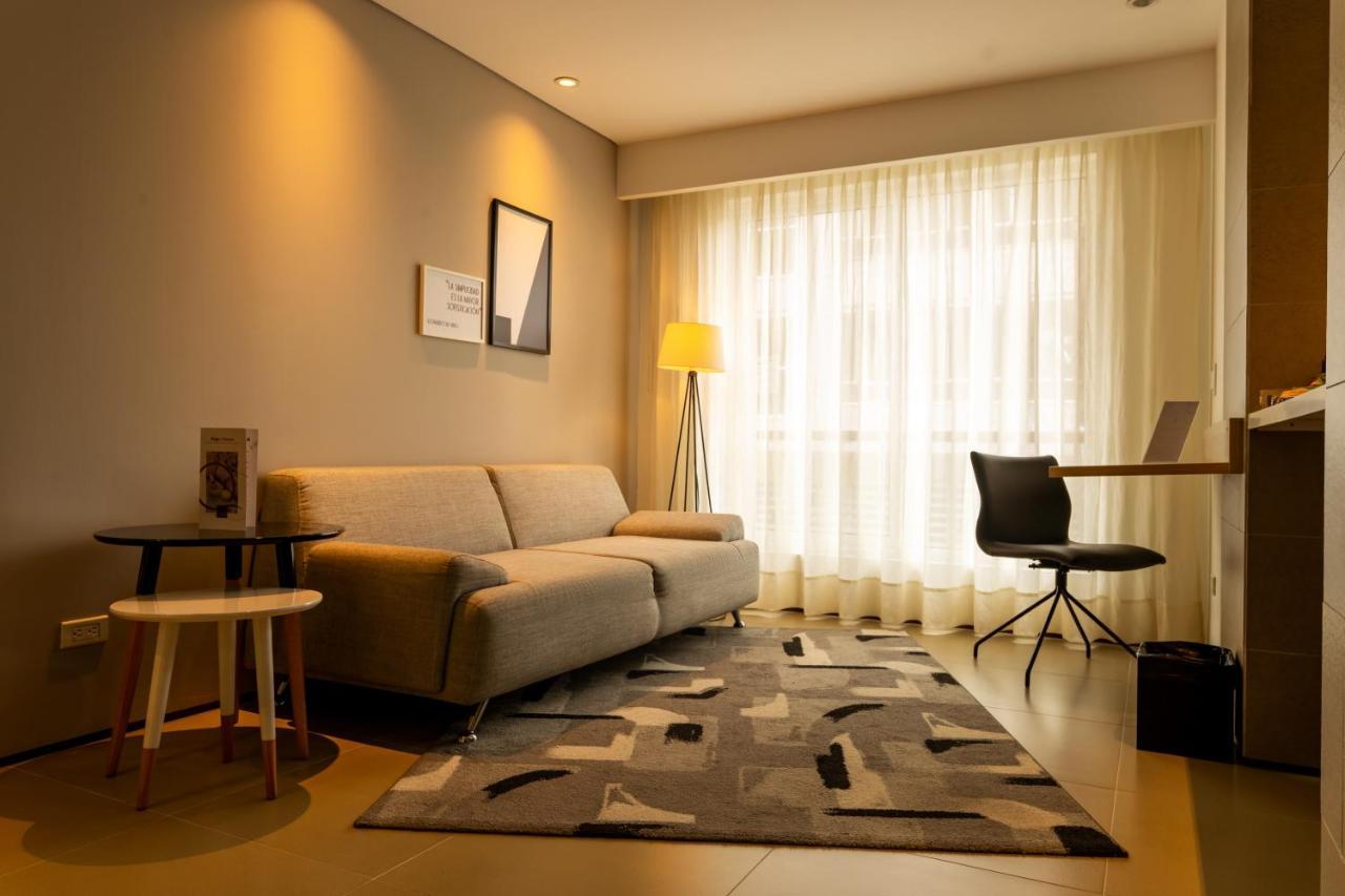 Quo Quality Hotel Manizales Buitenkant foto A living room