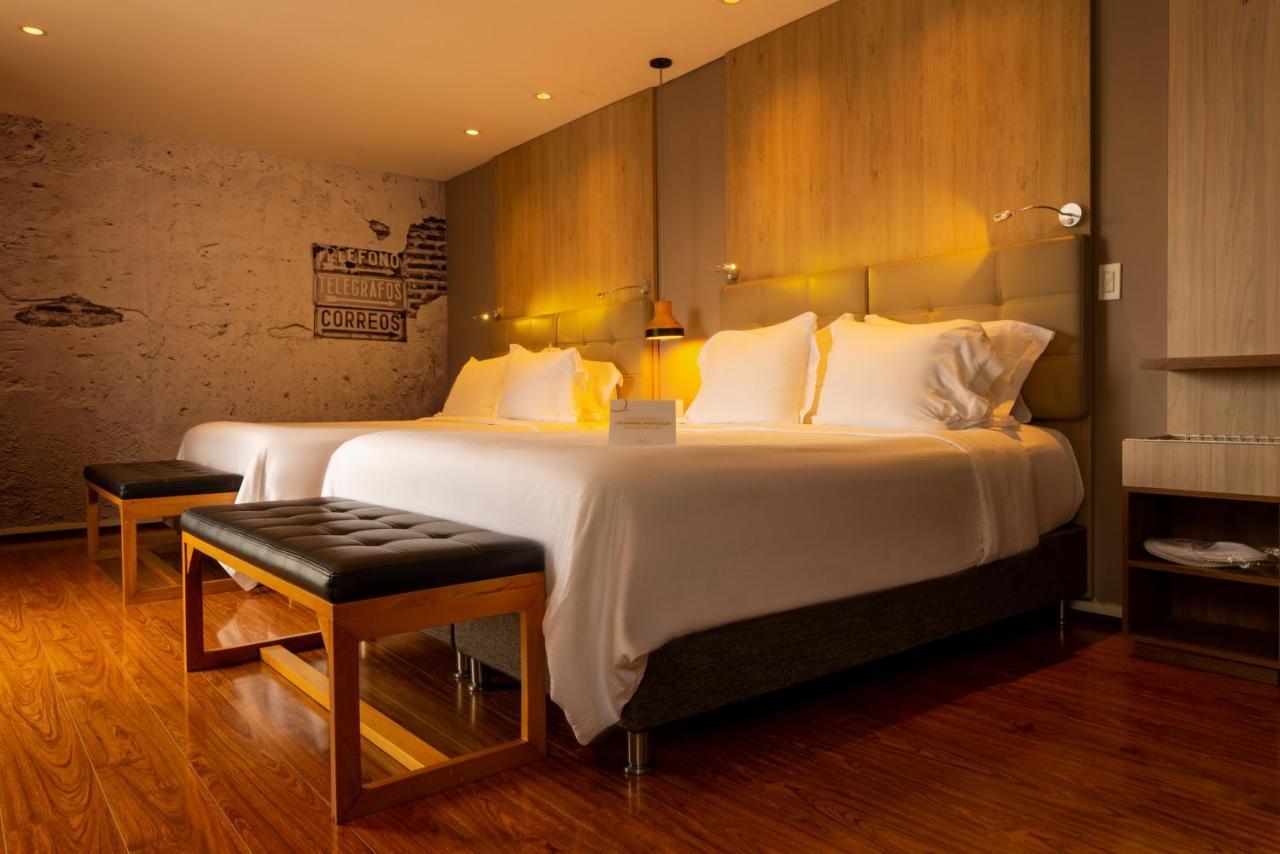 Quo Quality Hotel Manizales Buitenkant foto A bedroom at the hotel
