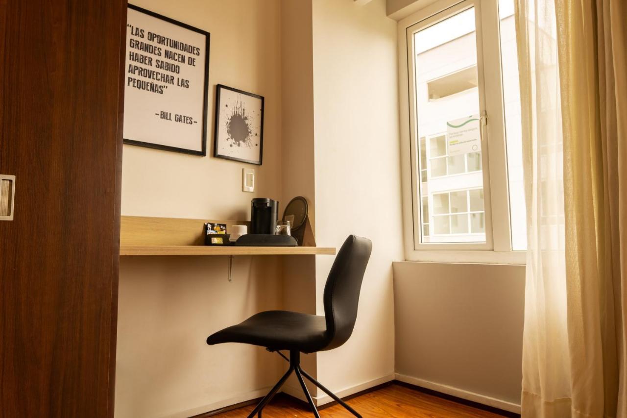 Quo Quality Hotel Manizales Buitenkant foto A typical study room