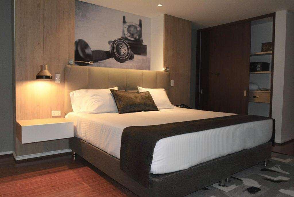 Quo Quality Hotel Manizales Kamer foto A bedroom at the hotel