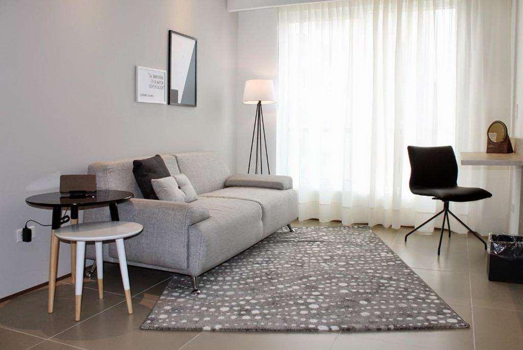 Quo Quality Hotel Manizales Kamer foto A living room with a rug