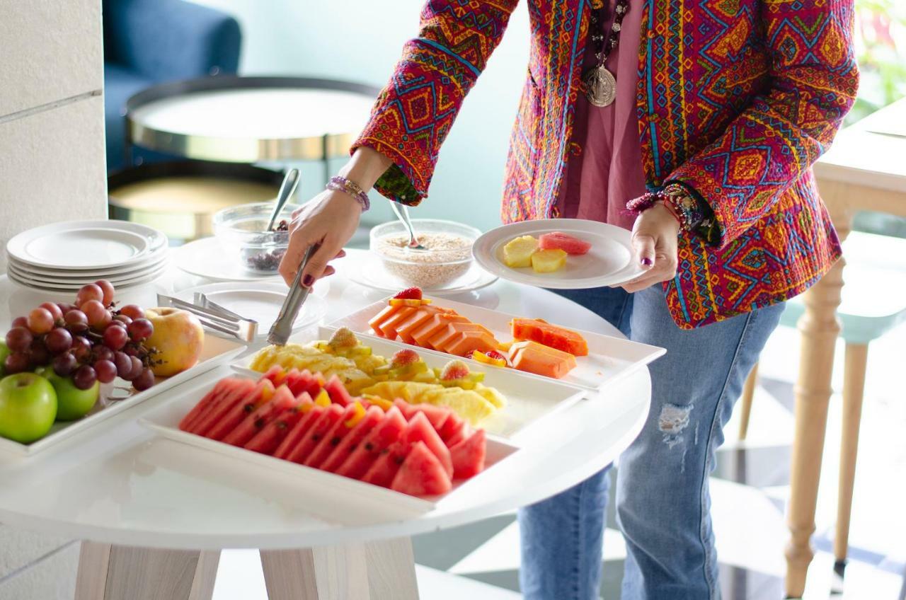 Quo Quality Hotel Manizales Buitenkant foto A buffet